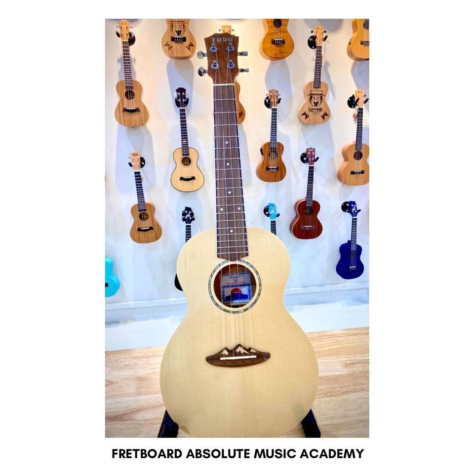 todo solid top spruce utd b20t 26’ ukulele tenor size